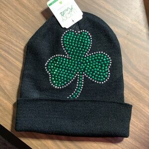 Black hat with shamrock on the front